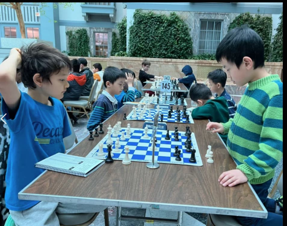 CheckMates team members and students gathered together