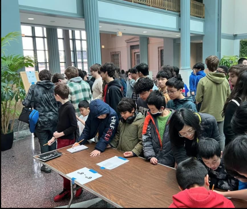 Students registering at a CheckMates tournament