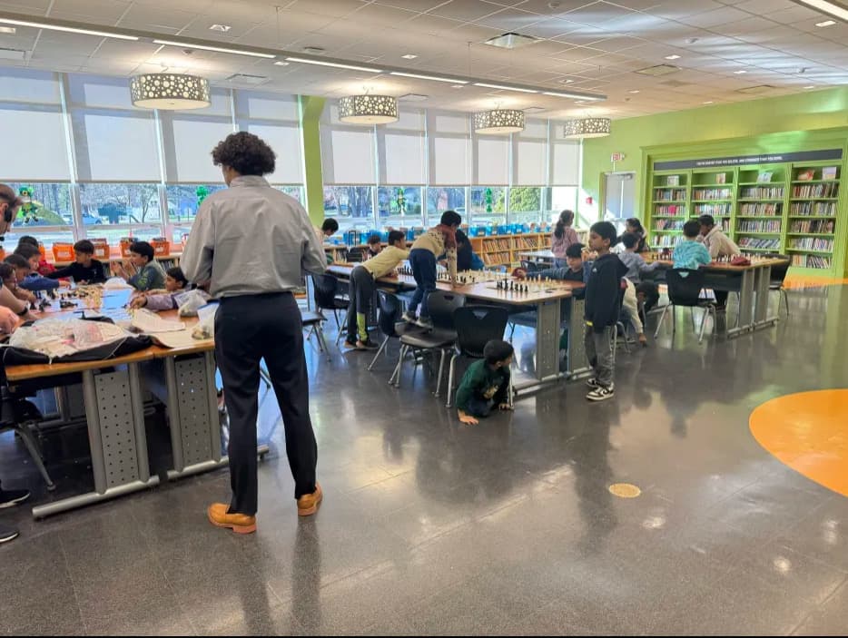 Indoor chess tournament with multiple students competing